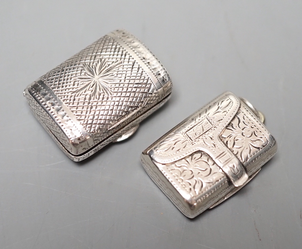 A George III engraved silver vinaigrette, modelled as a handbag, John Lawrence & Co, Birmingham, 1817, 23mm engraved 'Anne' and a similar William IV silver vinaigrette, Thomas Simpson Jn, Birmingham, 1831, 21mm.